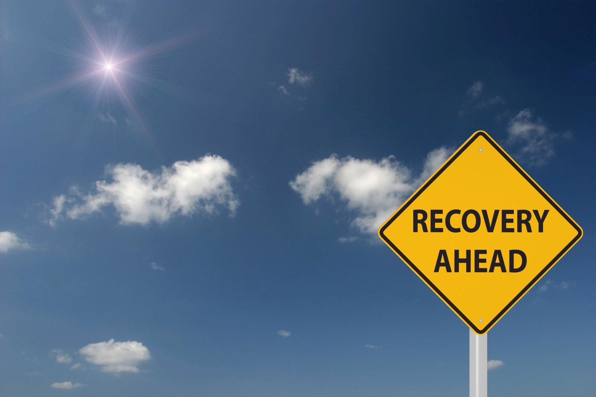 Recovery ahead warning sign concept